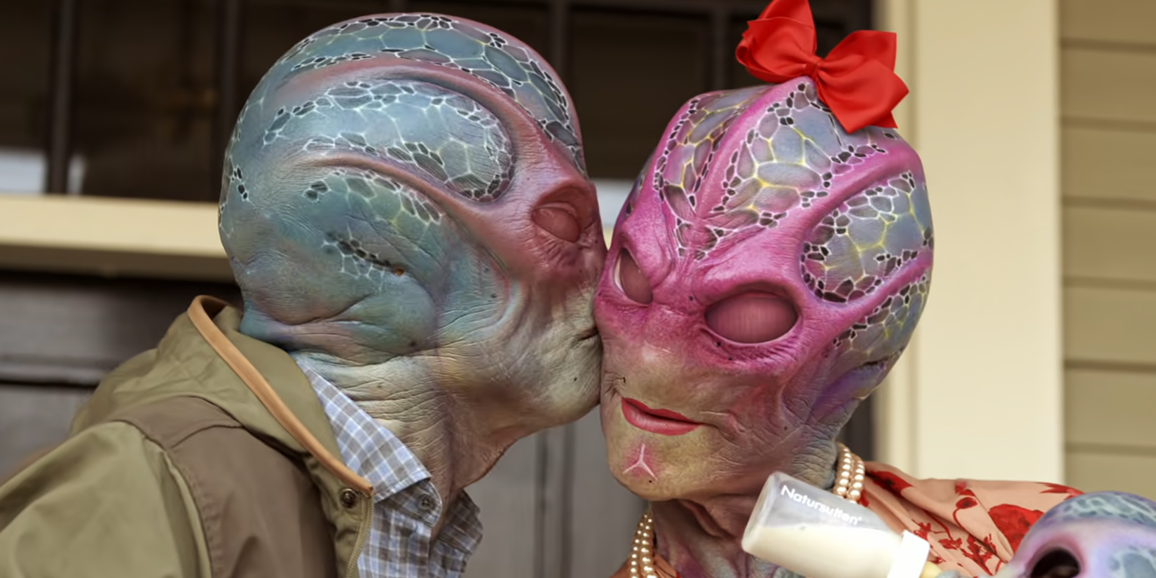Harry kissing his alien wife in a dream in Resident Alien
