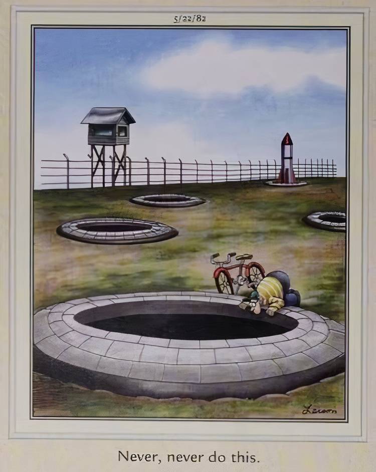 A man sticking his head over a rocket launch site in The Far Side.
