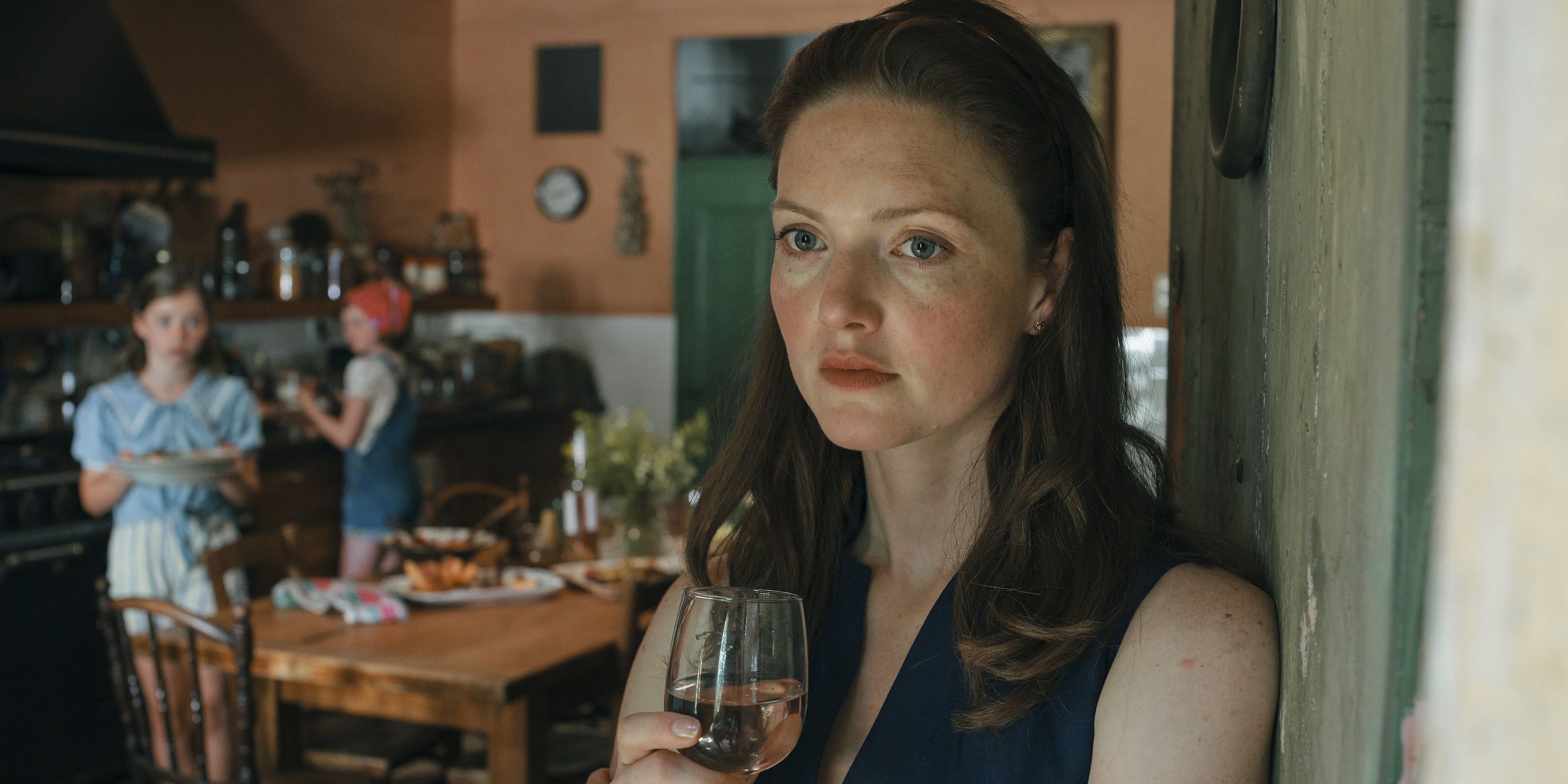 Rebecca holding a glass in The Stolen Girl episode 3