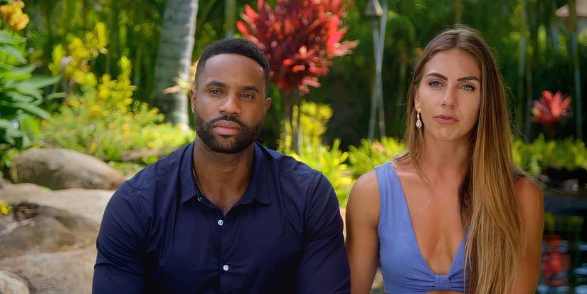 Nicole Tutewohl and Karl Collins sitting next to each other on USA Network's Temptation Island season 1