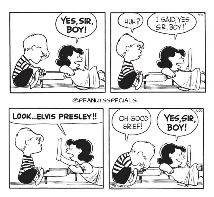 Lucy showing Schroeder a picture of Elvis Presley.