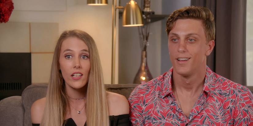 Kaci Campbell and Evan Smith sitting side by side in a confessional on USA Network's Temptation Island 2019