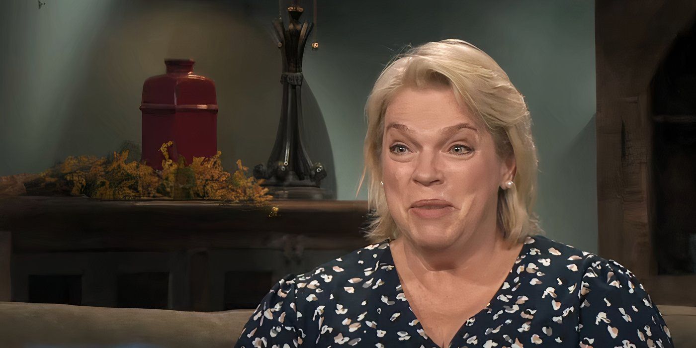 Sister Wives' Janelle Brown smiling and raising her eyebrows on the show
