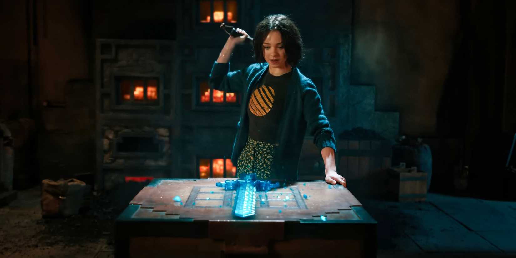 Natalie (Emma Myers) looks at her sword in A Minecraft Movie