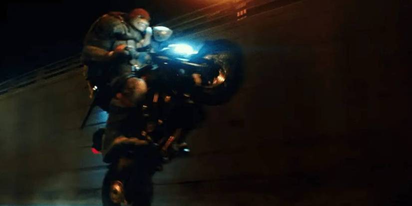Alan Ritchson as Raphael on a motorcycle in Teenage Mutant Ninja Turtles_ Out of the Shadows