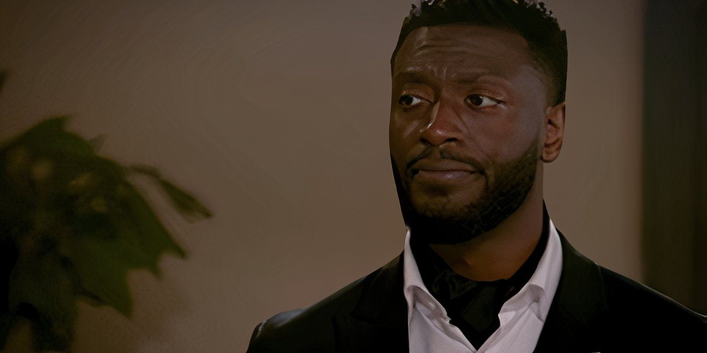 Aldis Hodge as Hardison wearing a suit on Leverage Redemption
