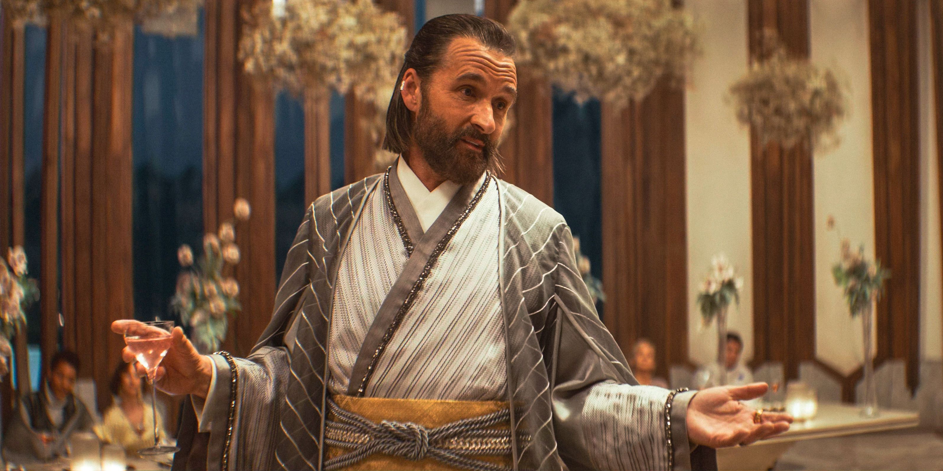 Perrin Fertha (Alastair Mackenzie) toasting to his daughter&rsquo;s engagement in Andor Season 2 Episode 2