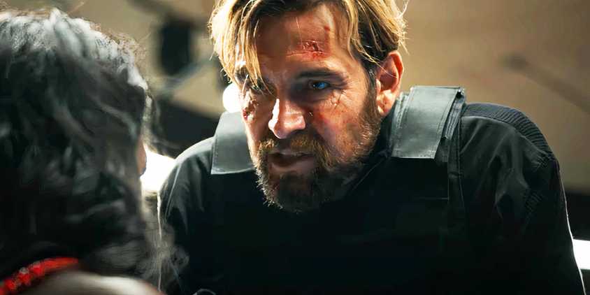 Antony Starr starring intensely at Viola Davis in G20