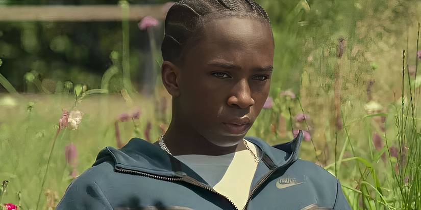 Araloyin Oshunremi as Stef sitting on a bench in Top Boy