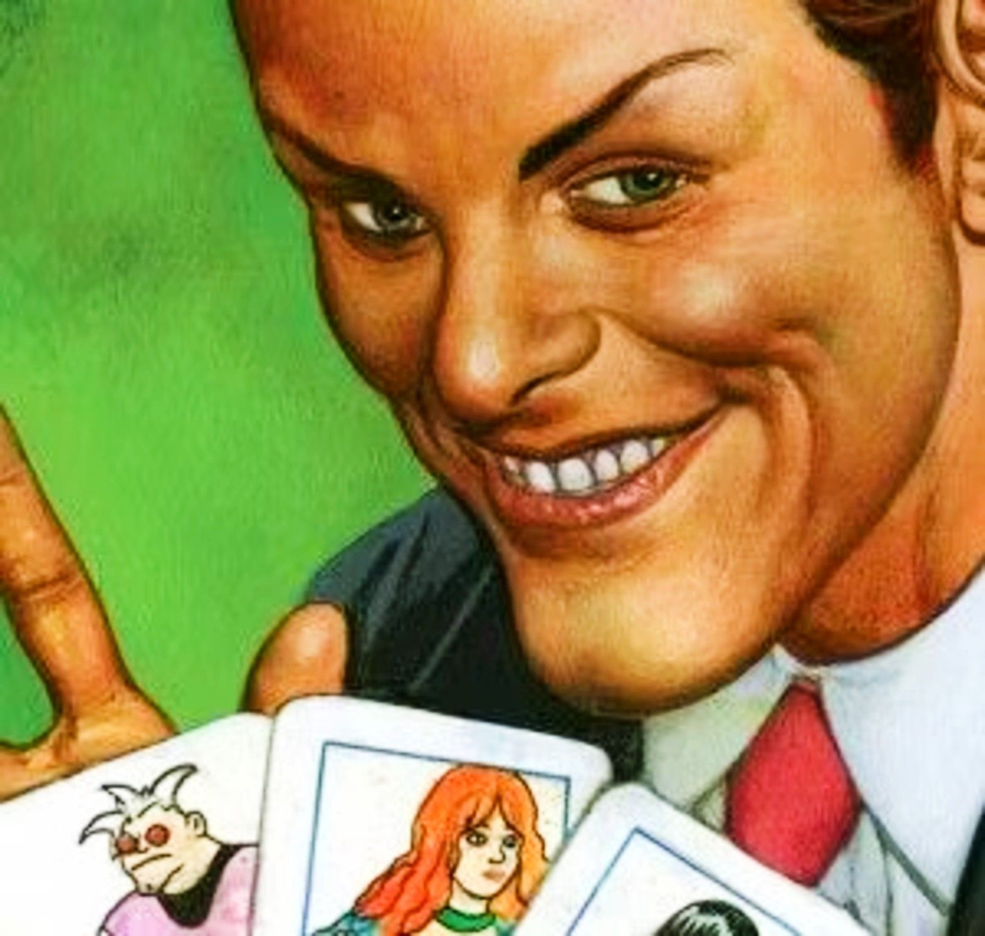 Arcade holding up playing cards with Marvel heroes on them and smiling wickedly
