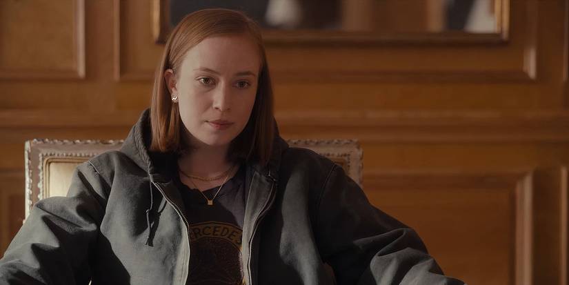 Ava sitting in a chair in Hacks