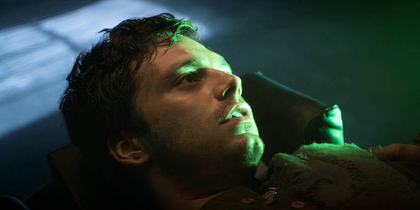 Bucky looking up at Steve as a prisoner in Captain America: The First Avenger (2011)