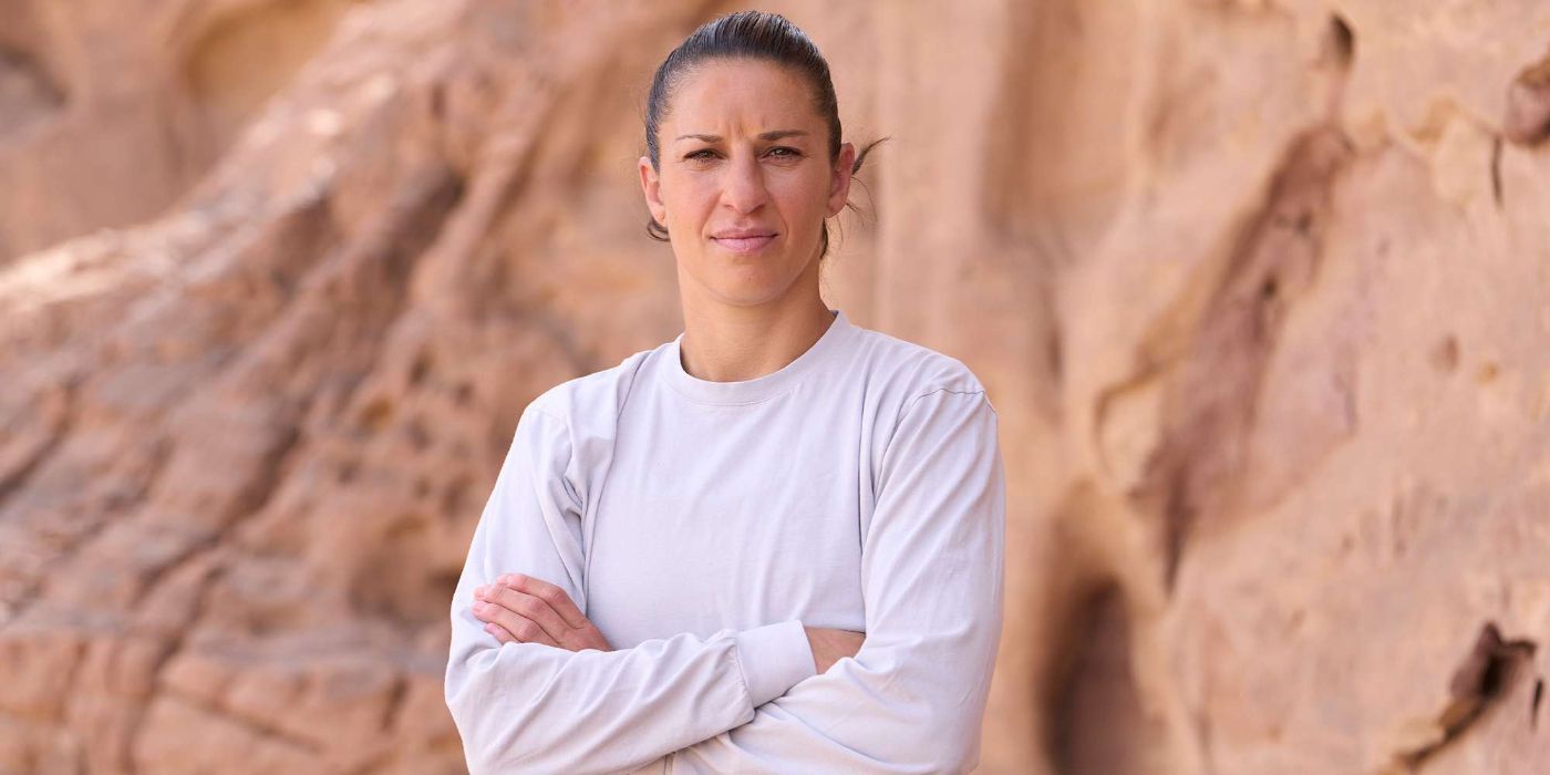 Carli Lloyd staring at the camera in Special Forces.