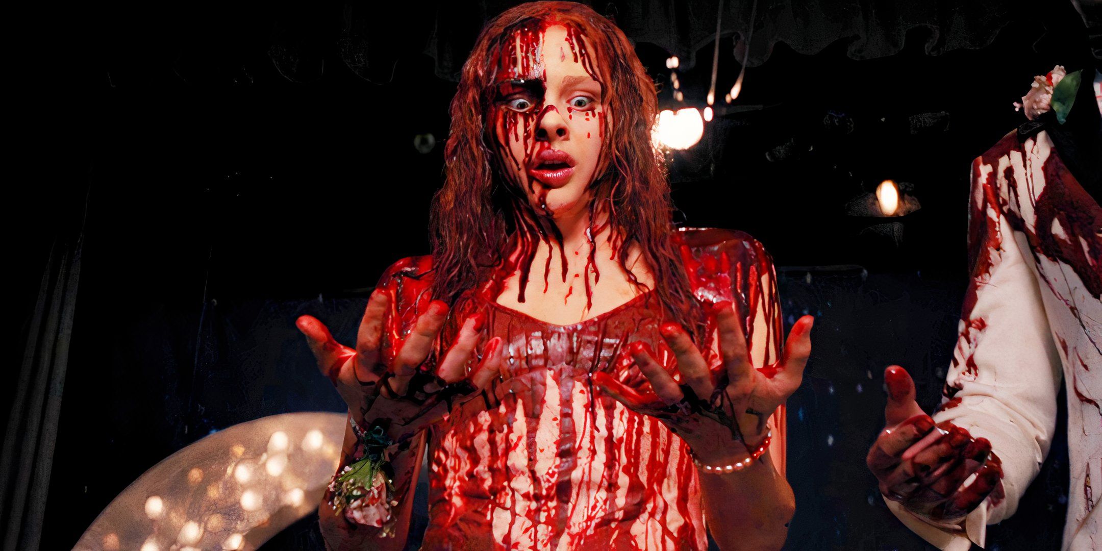 Carrie looks at herself in shock as she&rsquo;s covered in blood in the 2013 movie