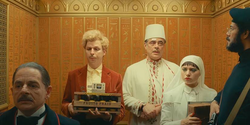 Cast of Phoenician Scheme in an elevator