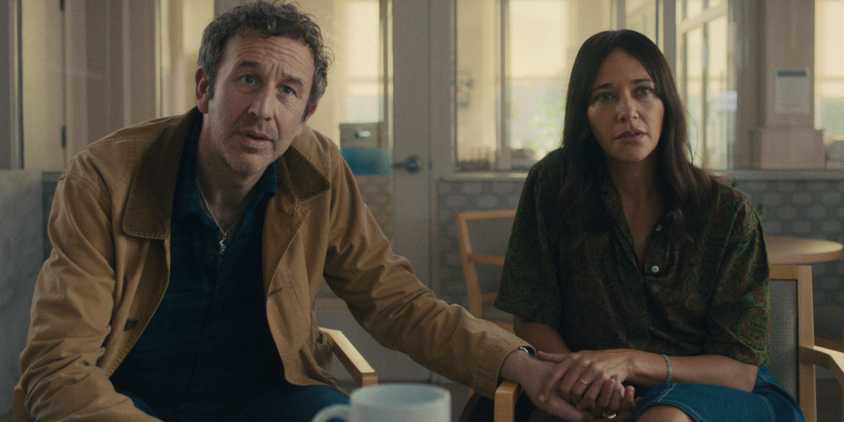 Chris O'Dowd and Rashida Jones holding hands and looking concerned in Black Mirror season 7 episode 1
