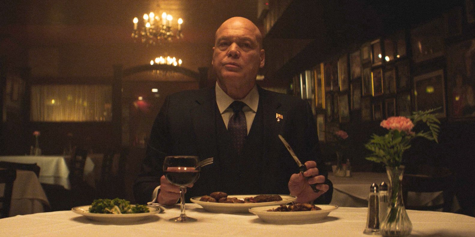 Wilson Fisk (Vincent D&rsquo;Onofrio) dining alone in a restaurant in Daredevil: Born Again Season 1 Ep 7