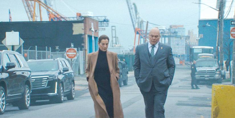 Vanessa (Ayelet Zurer) and Wilson Fisk (Vincent D'Onofrio) walking through Red Hook Port in Daredevil: Born Again Season 1 Ep 8