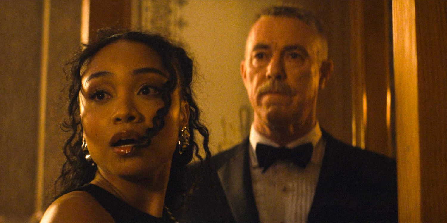 BB Urich (Genneya Walton) and Chief Gallo (Michael Gaston) looking amazed at the Black and White Ball in Daredevil: Born Again Season 1 Ep 8