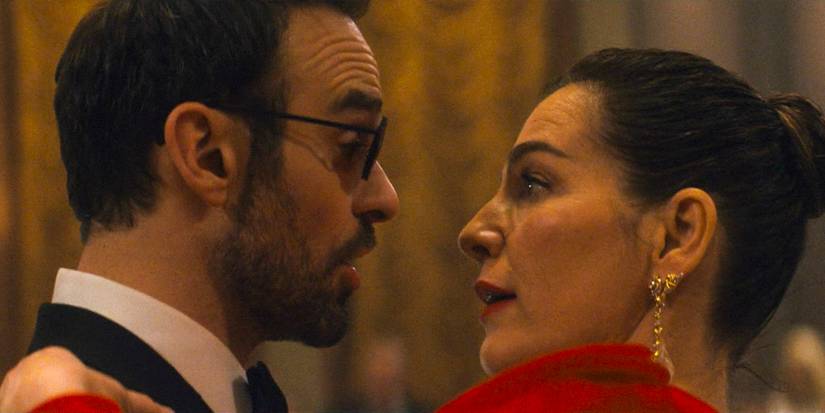 Matt Murdock (Charlie Cox) and Vanessa (Ayelet Zurer) talking while dancing together in Daredevil: Born Again Season 1 Ep 8