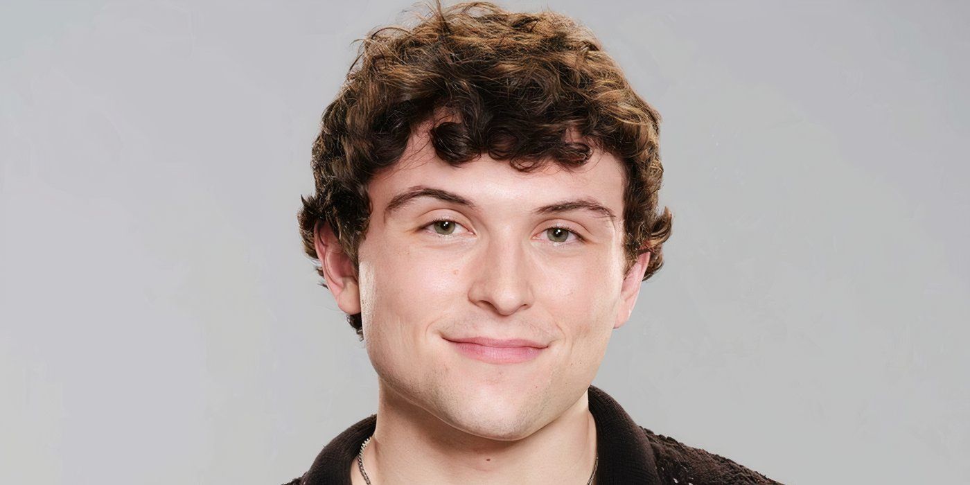 Destination X Season 1's Jonah Evarts smiling against a gray background.