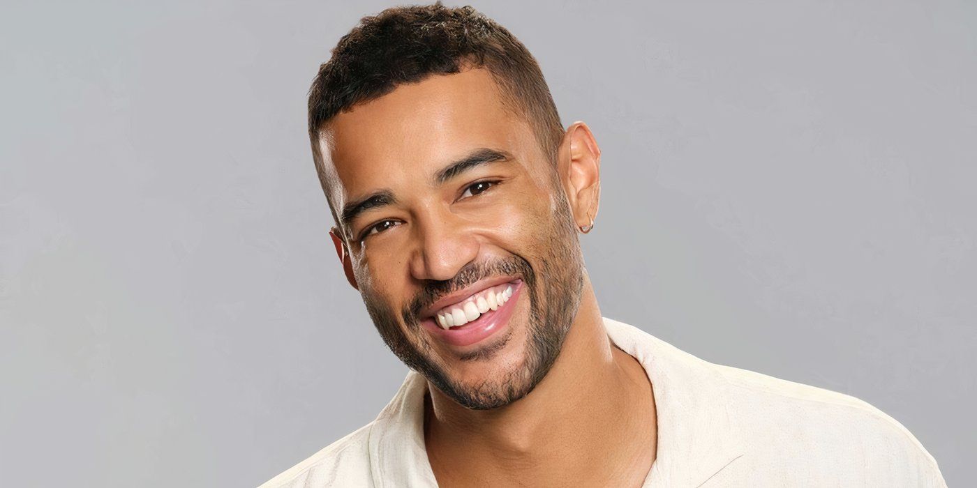 Destination X Season 1's Shayne Cureton smiling against a gray background.