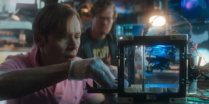 Walton loading Bob's DNA into the cloner in Black Mirror season 7's episode 6
