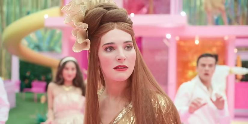 Doctor Barbie (Hari Nef) looking stunned during a dance sequence in Barbie.