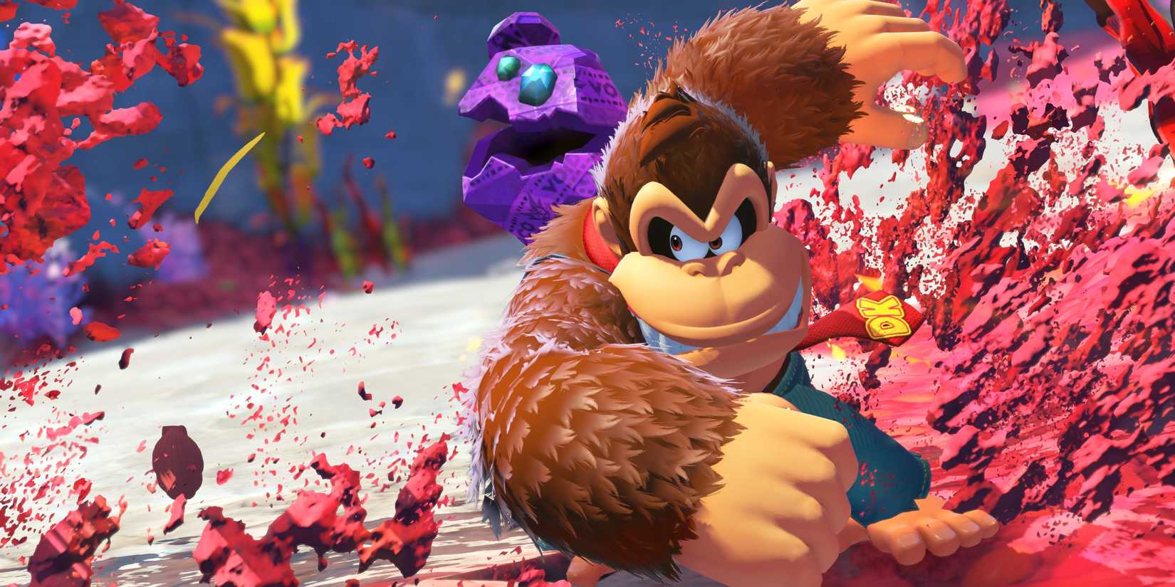 An official image of Donkey Kong Bananza, showing Donkey Kong destroying the surrounding terrain alongside his rock side kick.
