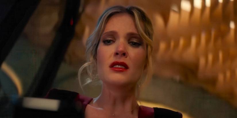 Violet (Meghann Fahy) terrified in Drop