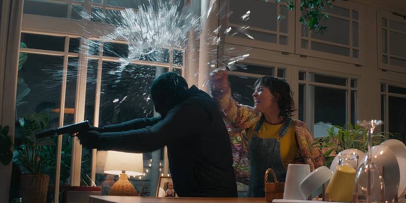 Violett Beane as Jen and Ben Pelletier as her hostage taker in Drop