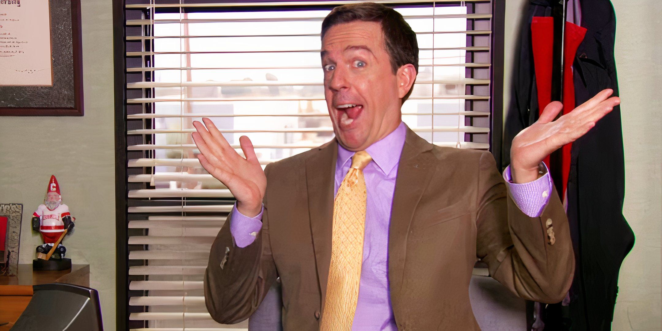 Ed Helms looking excited as Andy Bernard in The Office