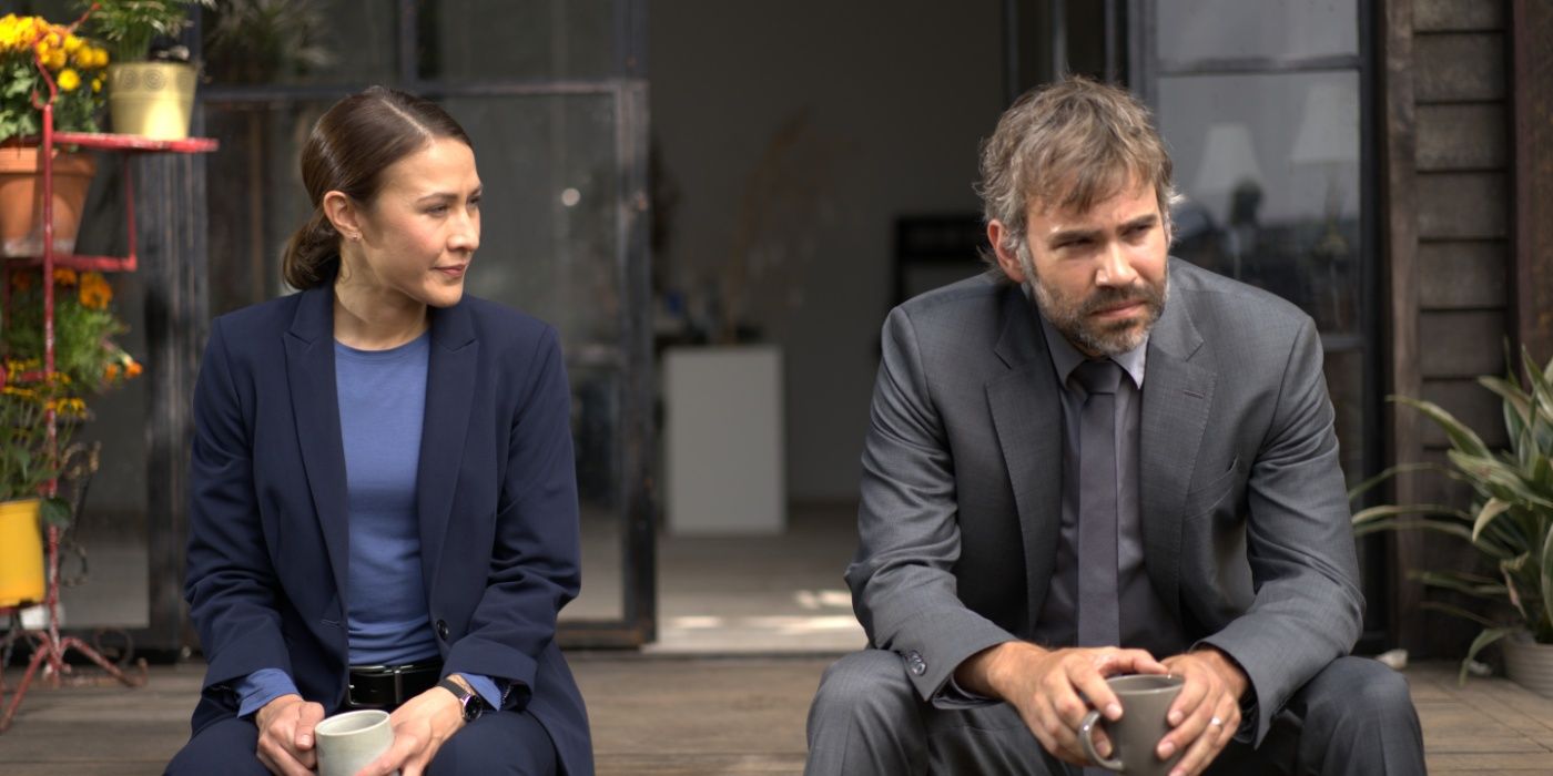 Elle Maija Tailfeathers and Rossif Sutherland sitting on porch in Three Pines