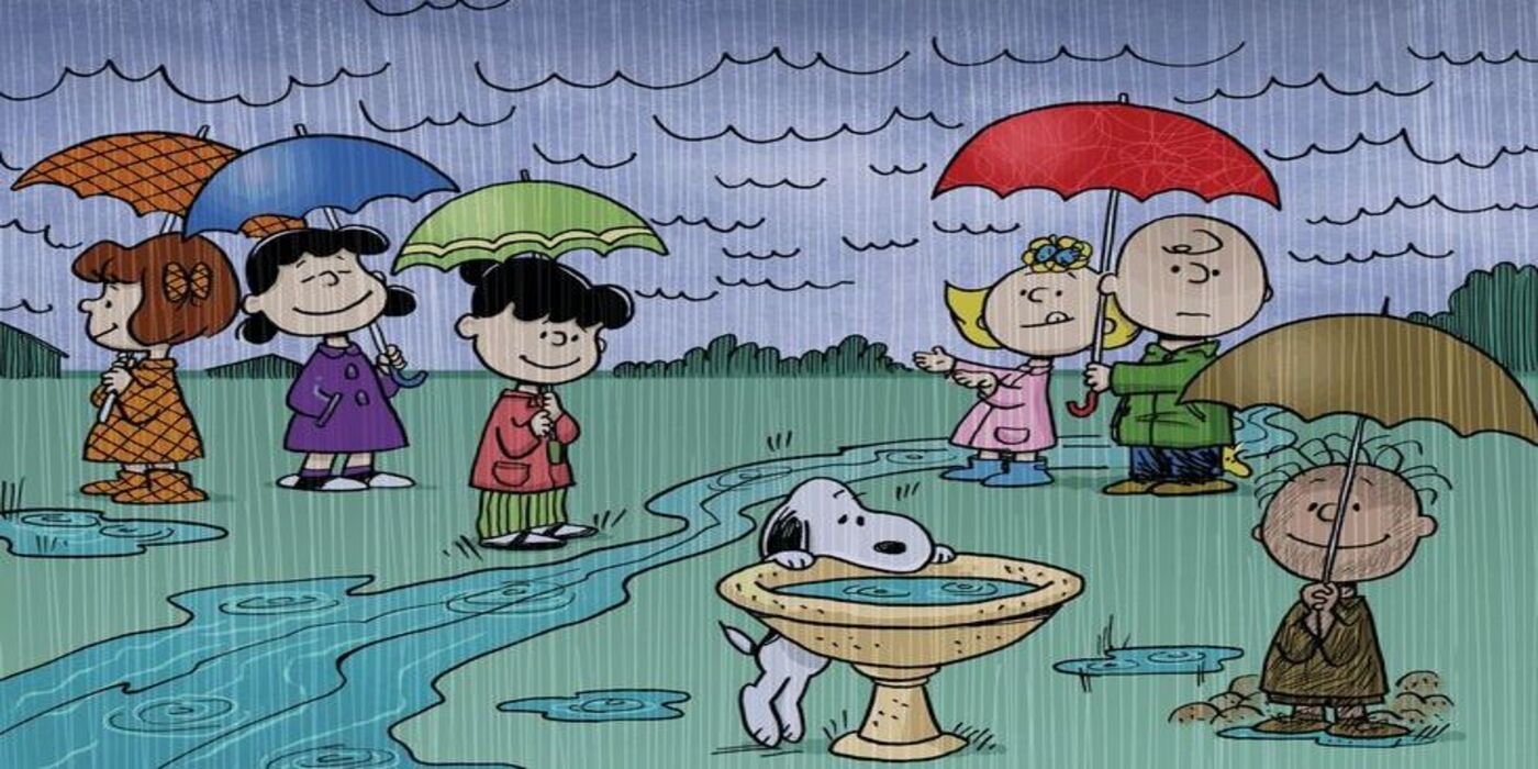 The Peanuts gang in the rain with umbrellas.