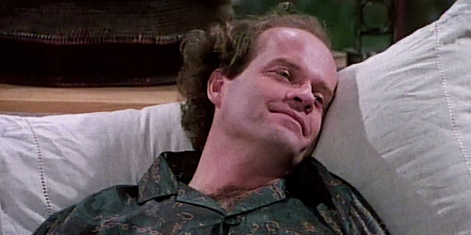 Frasier lying in bed on his day off in Frasier