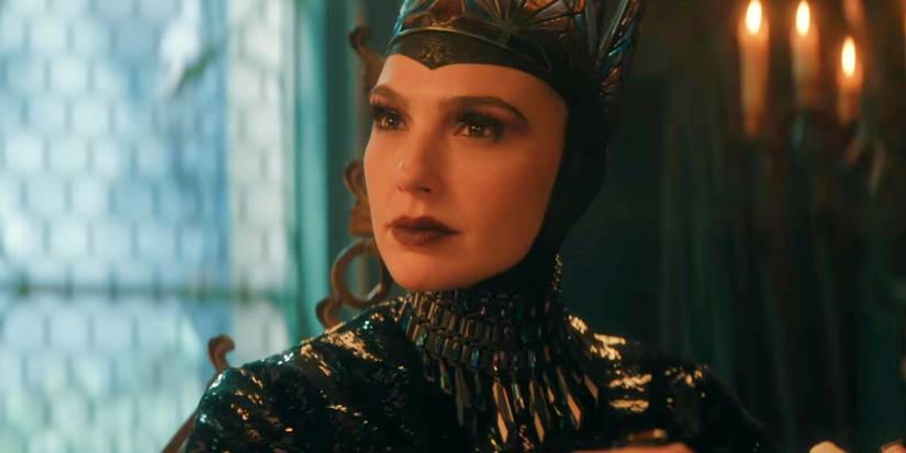 Gal Godot as Evil Queen listening intently in Snow White 2025