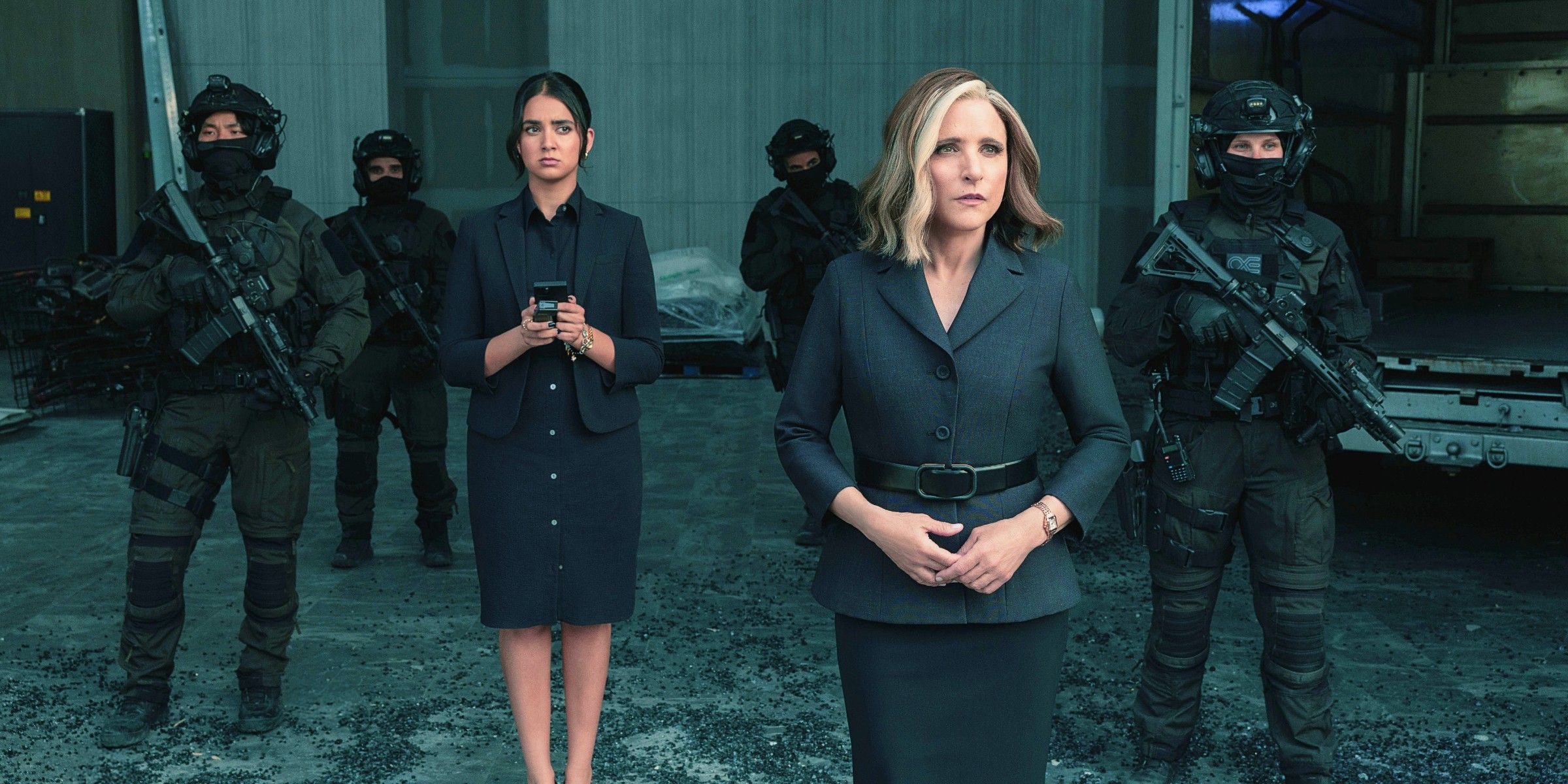Geraldine Viswanathan as Mel and Julia Louis-Dreyfus as Valentina Allegra de Fontaine Standing With Armed Guards In Thunderbolts