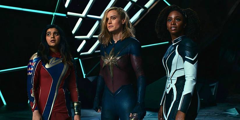 Iman Vellani's Ms. Marvel, Brie Larson's Captain Marvel, and Teyonah Parris' PH๏τon stand together in The Marvels (2023)