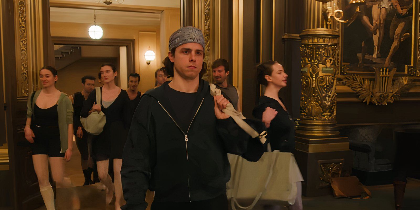 Ivan du Pontavice as Gabin Roux walks into a room with other dancers in Etoile