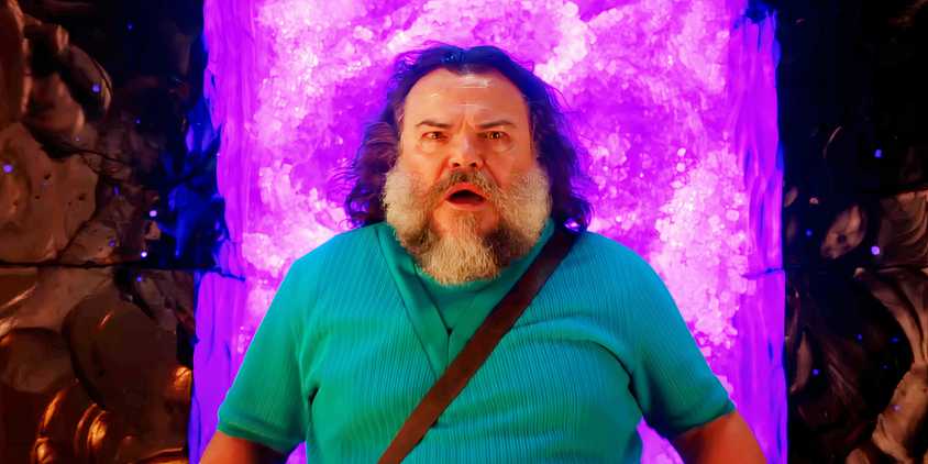 Jack Black standing in front of a purple portal looking shocked in A Minecraft Movie