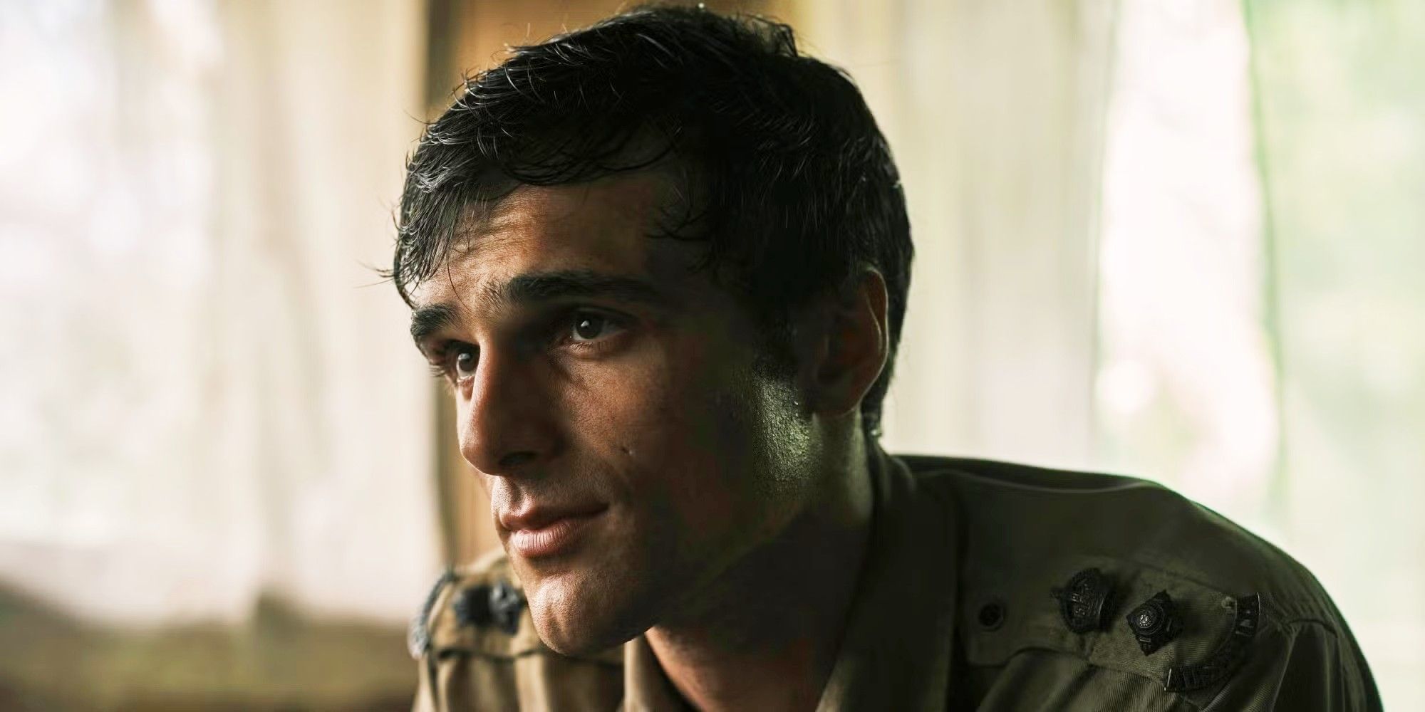 Jacob Elordi as Dorrigo leaning forward with a slight smile in The Narrow Road to the Deep North