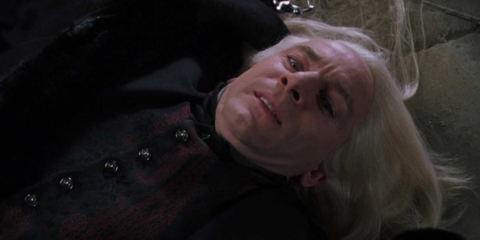 Jason Isaacs on the ground as Lucius in Harry Potter and the Chamber of Secrets