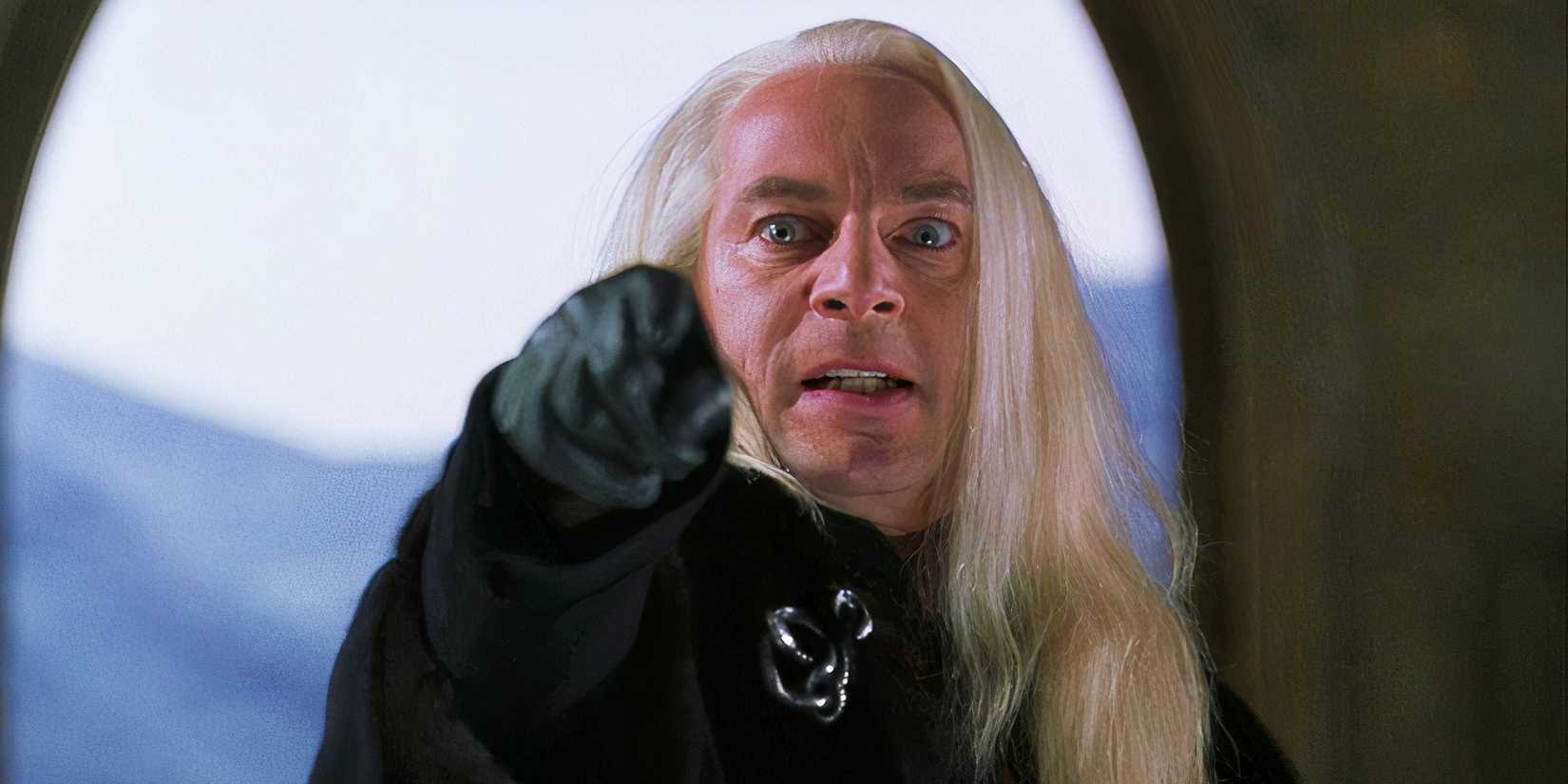 Jason Isaacs pointing angrily as Lucius in Harry Potter and the Chamber of Secrets