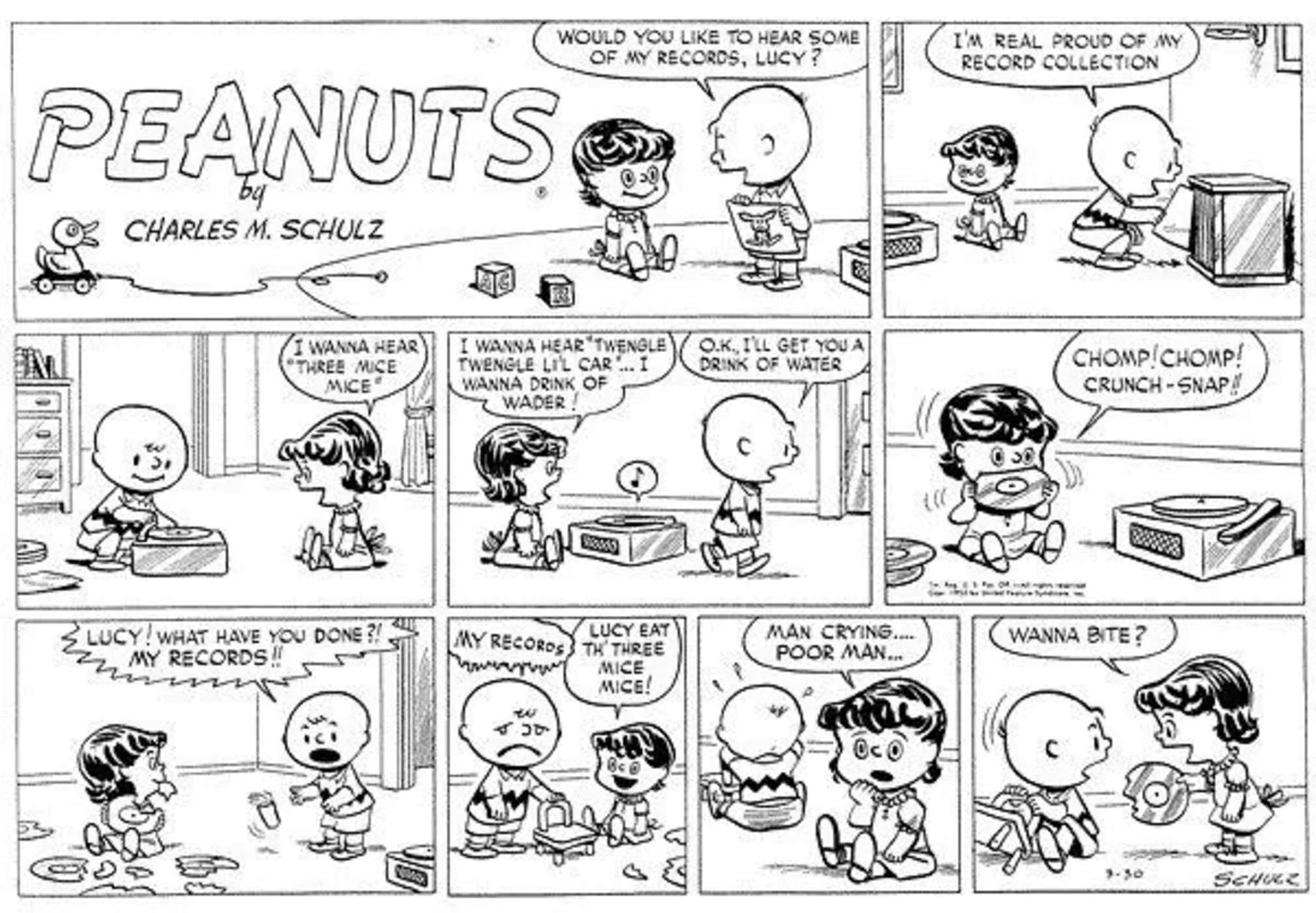 Lucy chewing on Charlie Brown&rsquo;s record.