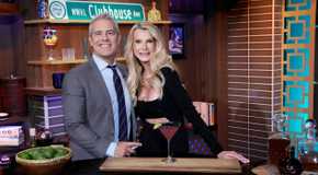 The Golden Bachelorette's Joan Vassos and Andy Cohen at Watch What Happens Live posing behind the bar
