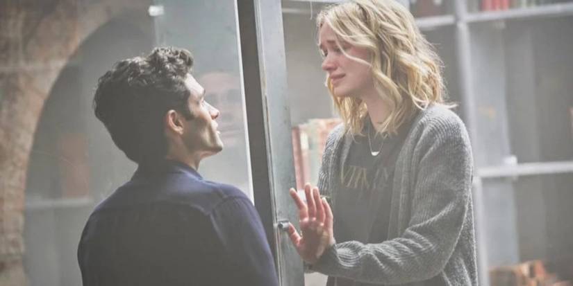 Joe And Beck On Opposite Sides Of The Cage In You Season 1