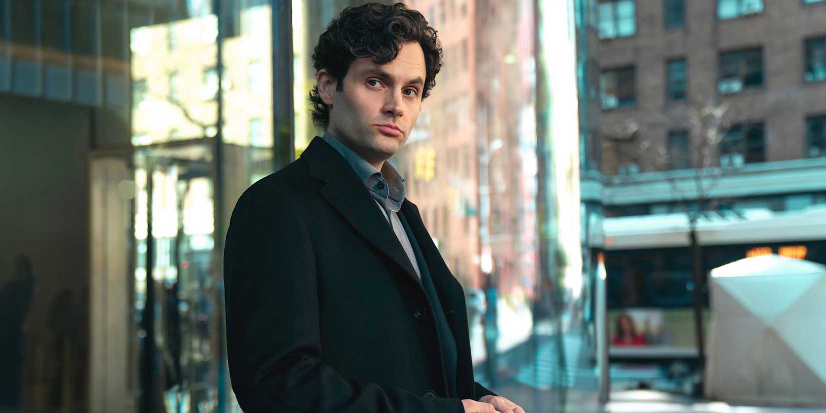 Joe Goldberg looks to the side in You Season 5