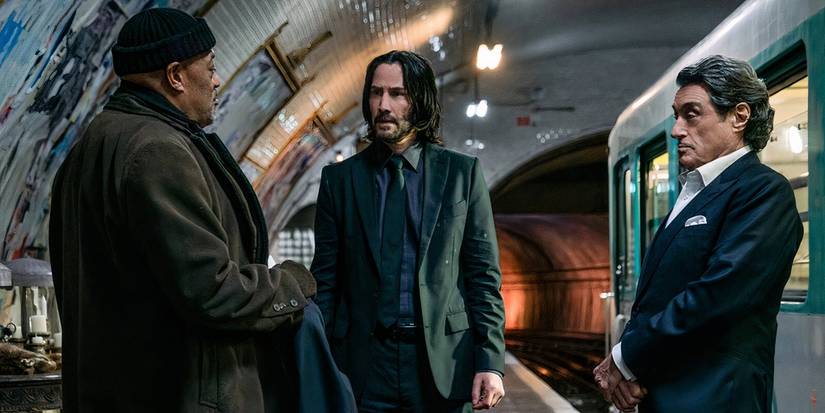 Laurence Fishburne as the Bowery King, Keanu Reeves as John Wick, and Ian McShane as Winston Scott in John Wick: Chapter 4