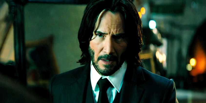 John Wick looking at Bowery King in Chapter 4
