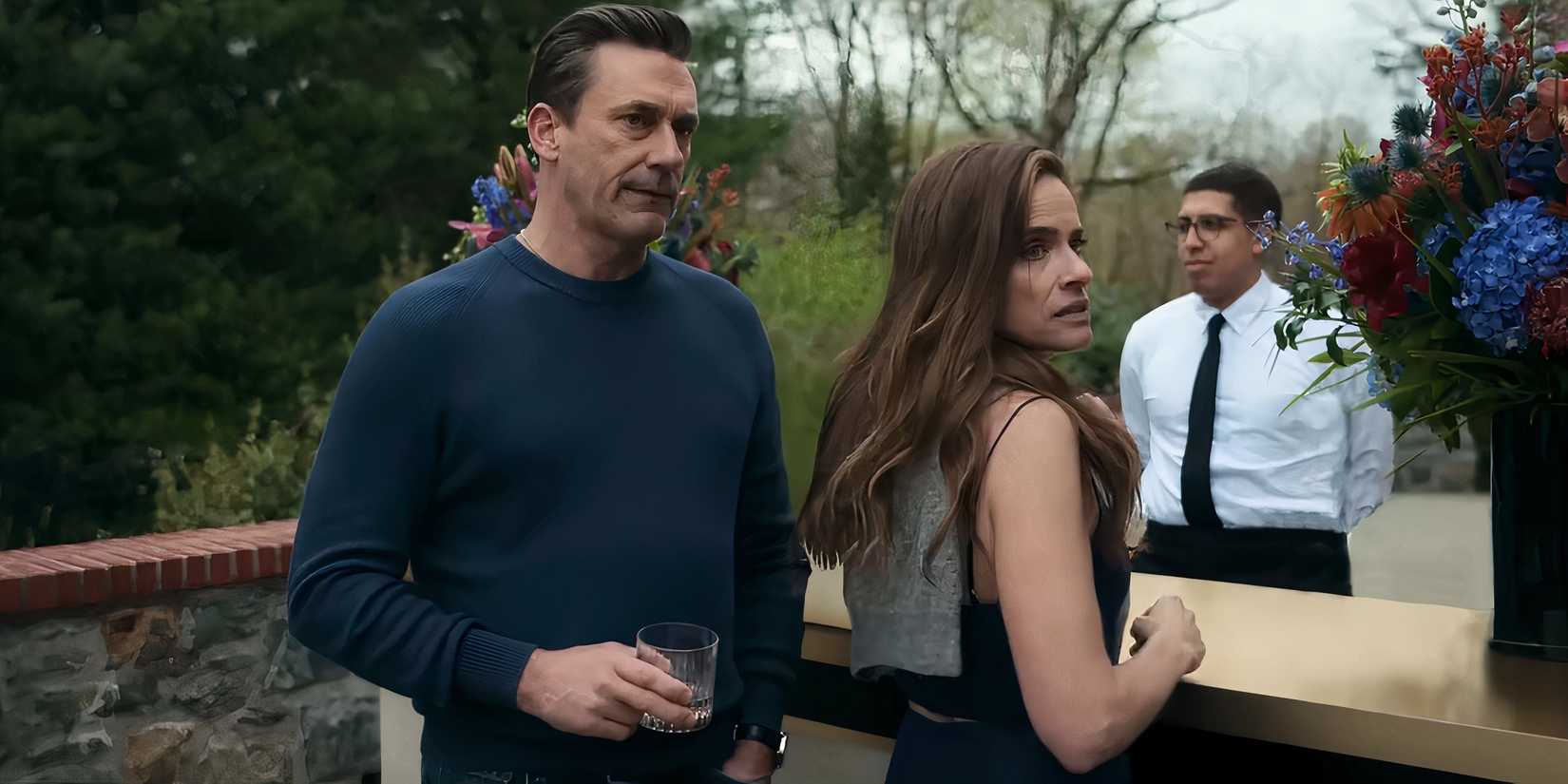 Jon Hamm's Coop and Amanda Peet's Mel looking upset at something in Your Friends and Neighbors